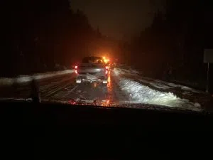 Traffic backed up near on the Nisga'a Highway on Monday, December 15th due to a fallen tree and downed powerlines // CFNR Newsroom