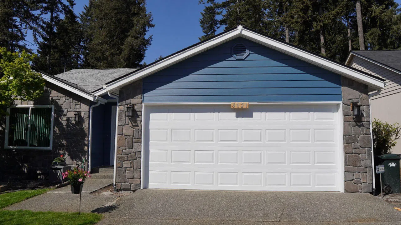 Blue siding with rock accents