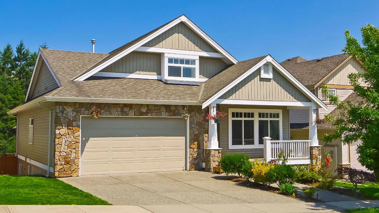 Beige siding with beautiful stone accents