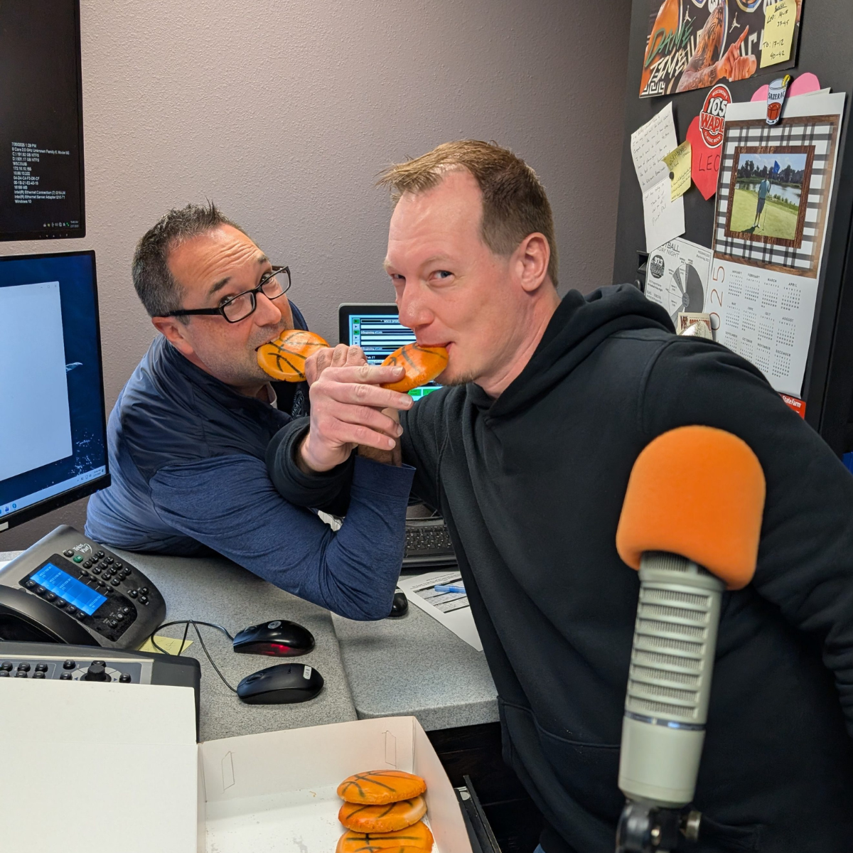 PJ and Nick eating basketball cookies