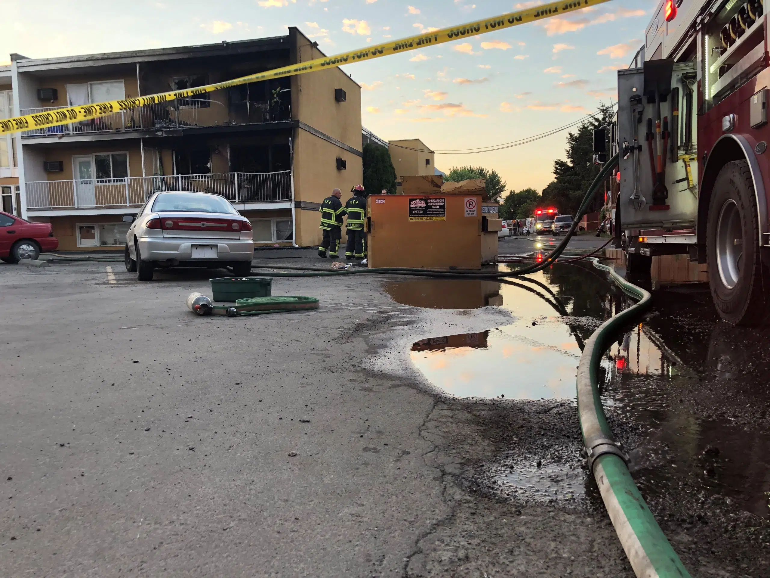 Early morning fire destroys at least two apartments, damages others