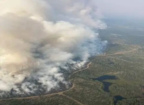 Flat Lake fire grows to almost 200 square kilometres; overnight weather helping fire fight