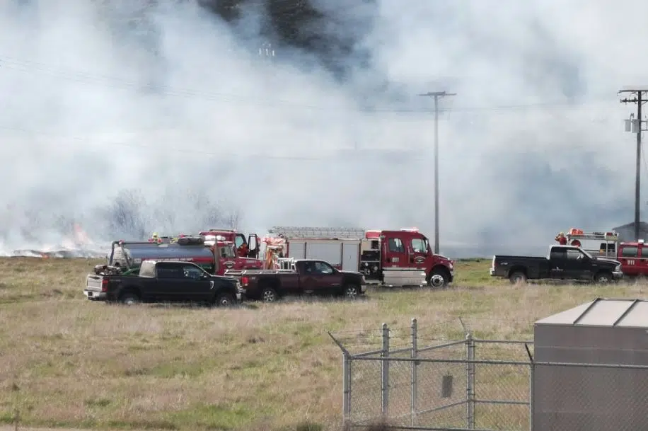 Firefighters battling grassfire west of Pritchard