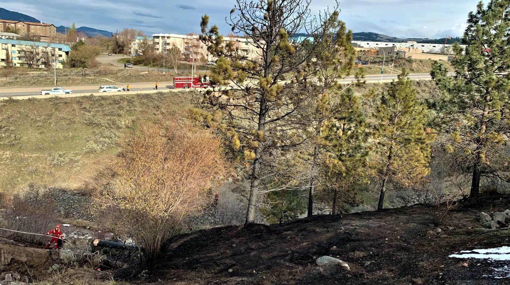 Kamloops Fire Rescue says Saturday grass fire near TRU was sparked by homeless camp