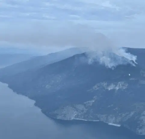 Lower East Adams Lake now 219 ha; burning away from properties on evacuation alert