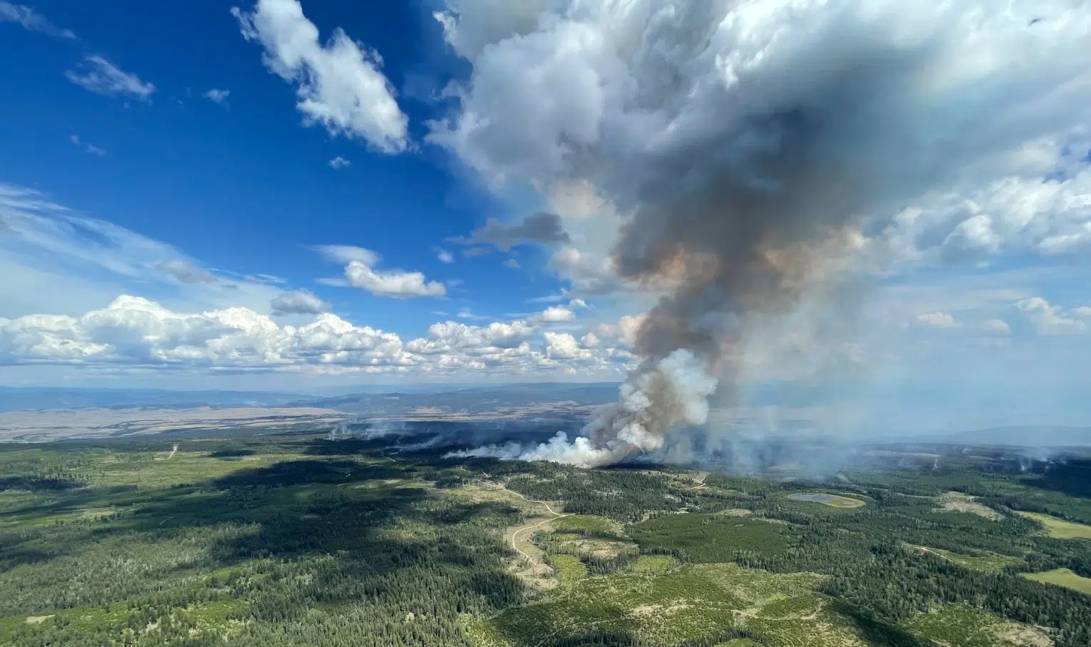 Increased activity at Ross Moore Lake fire leading to column of smoke