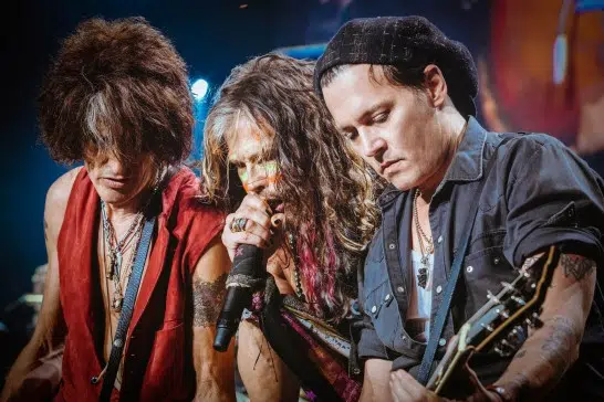 Johnny Depp performs with Aerosmith on their “LET ROCK RULE” Summer Tour