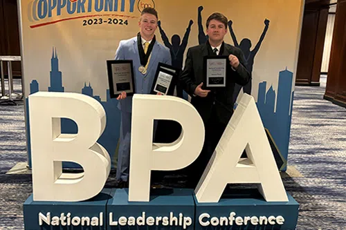 Business students from Bay College and Lake Superior State University (LSSU) receive awards at leadership conference