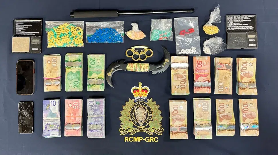 Drugs, Weapons, Money Seized In Trafficking Investigation