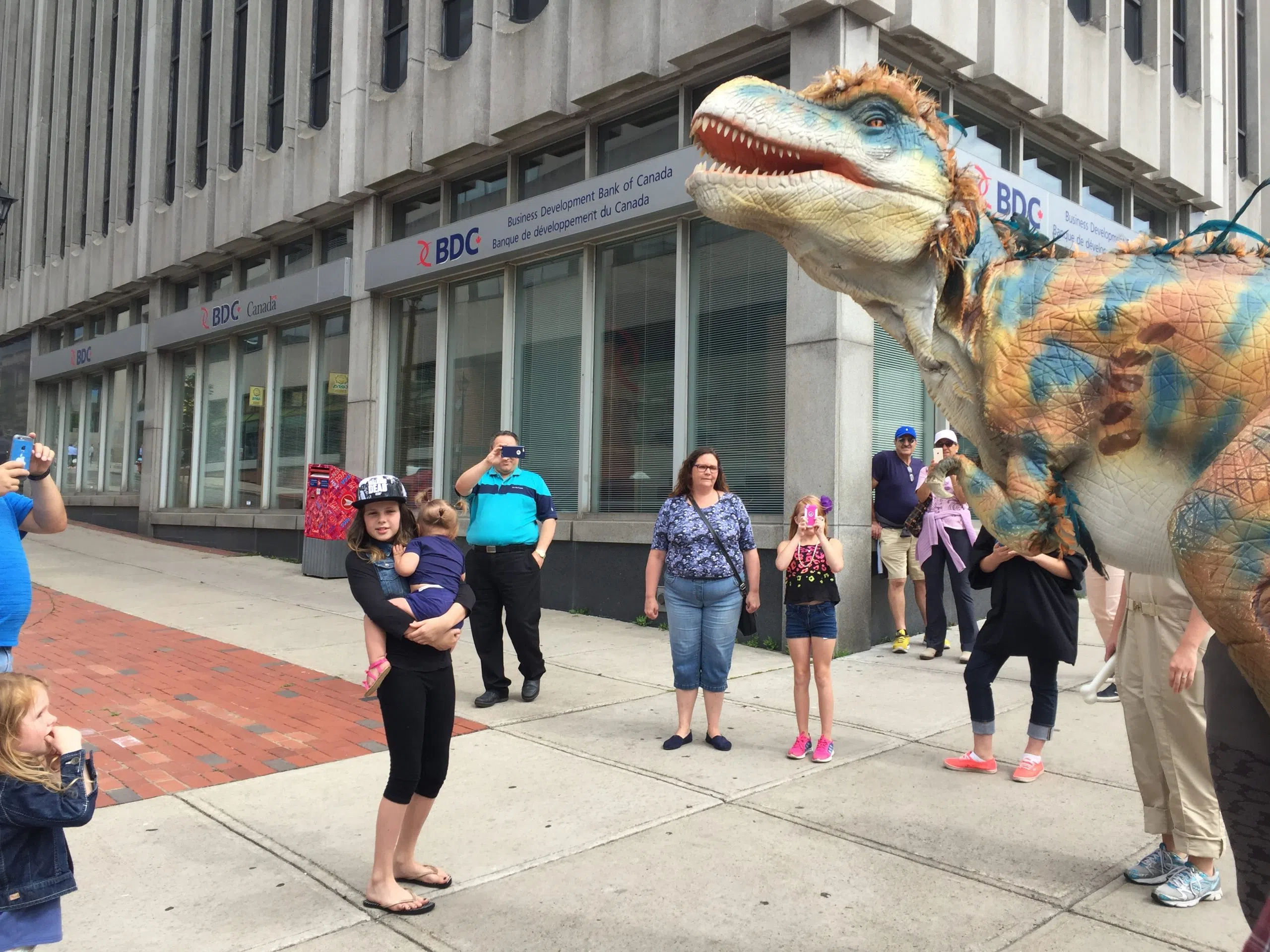 Just Another Tuesday Uptown With A Dinosaur Walking Around