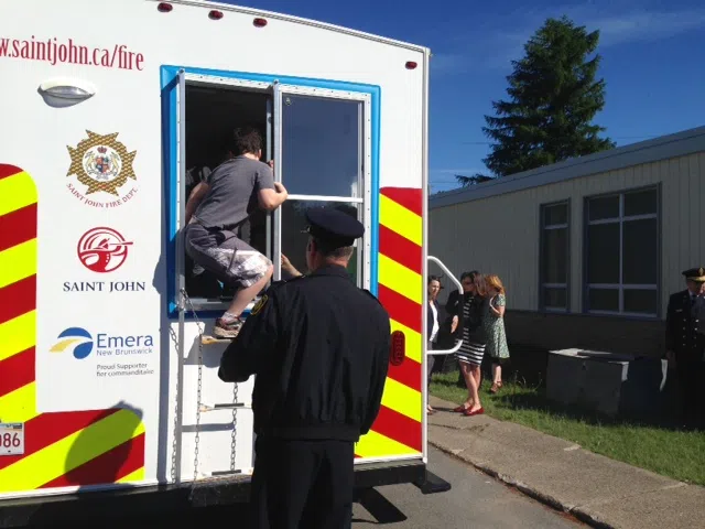 Students Learn Fire Safety In A New Modified Trailer