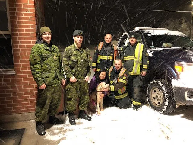 Firefighters, Soldiers Rescue Lost Dog During Blizzard