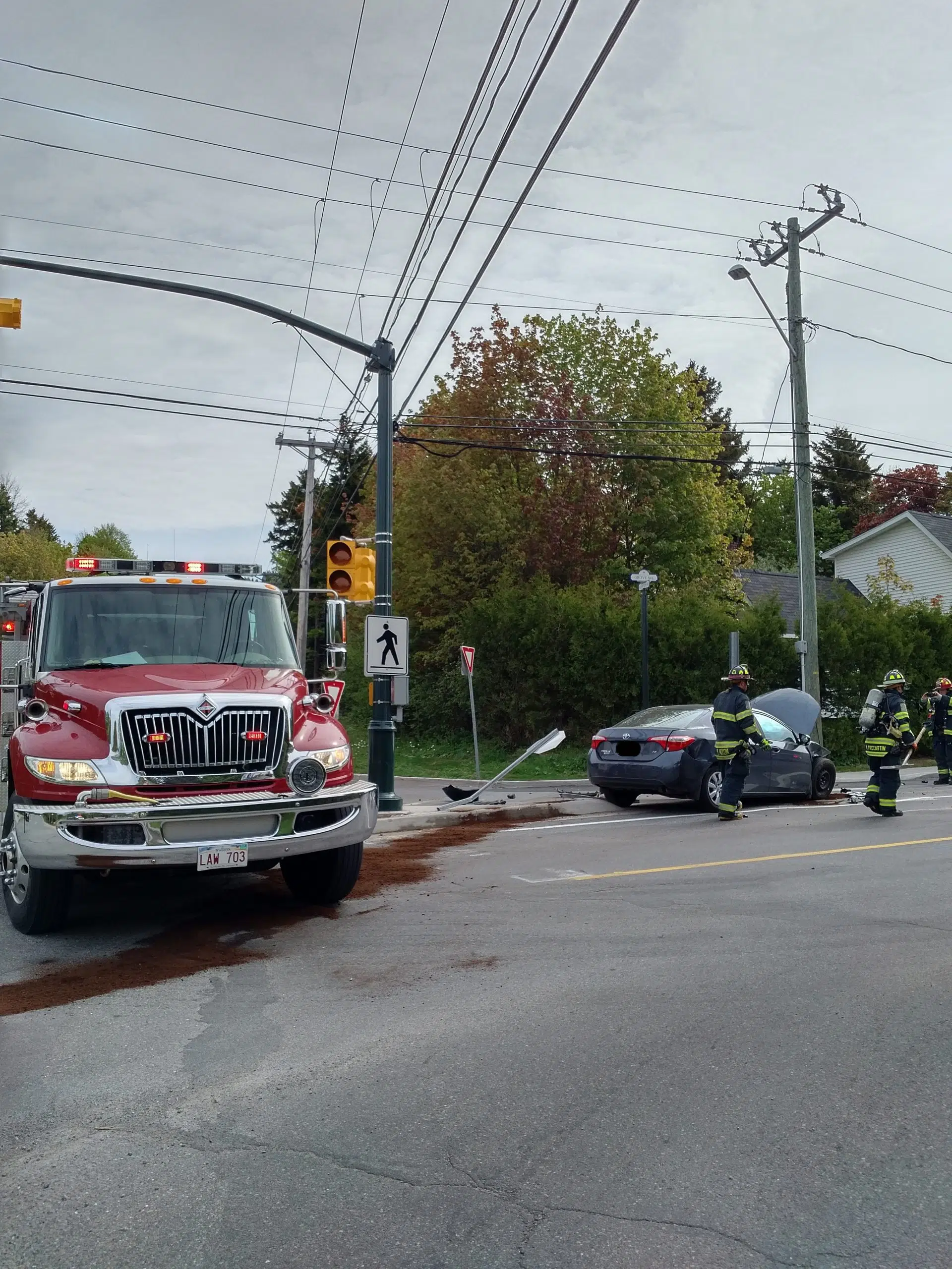 Two-Car Crash Shuts Down Road, Badly Damages Vehicles