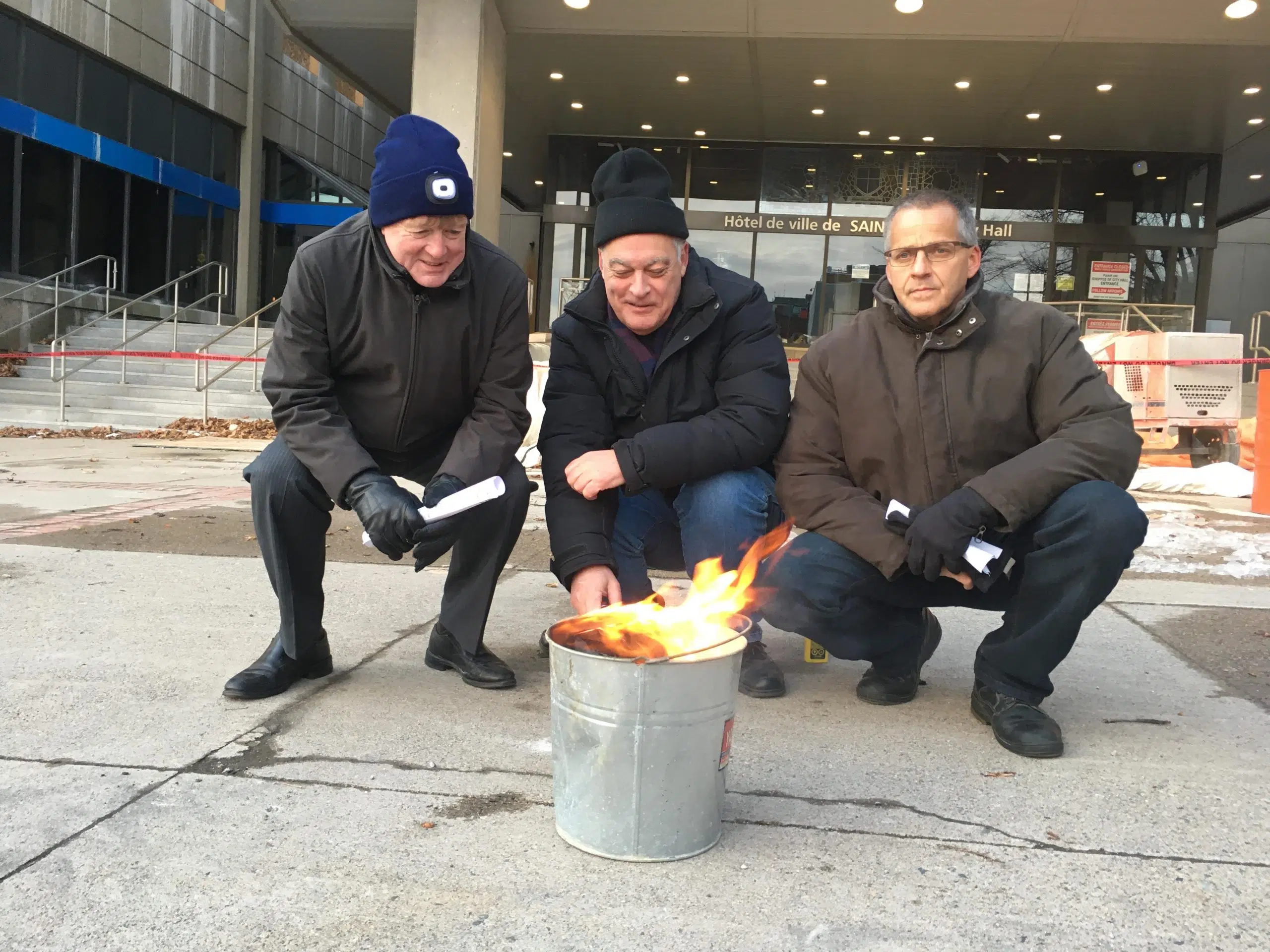 Group Burns 'Useless' Code Of Conduct Document On City Steps 