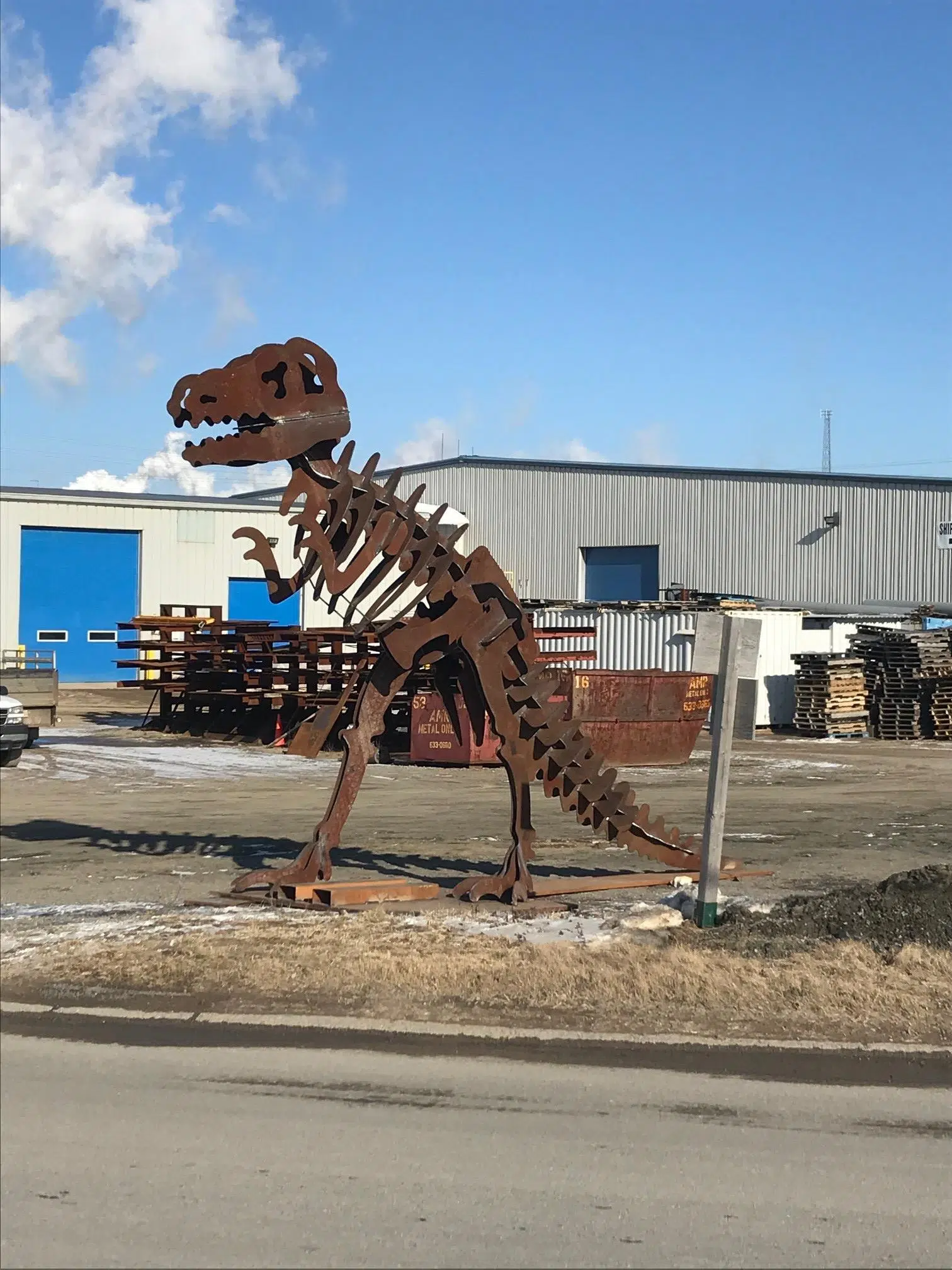 Bourque Industrial’s Dinosaur Statue Draws Scores of Spectators