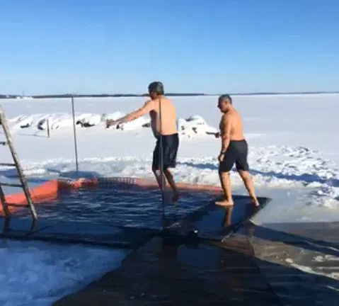 Polar Plunge Participants Battle Weather For Jump in Lake