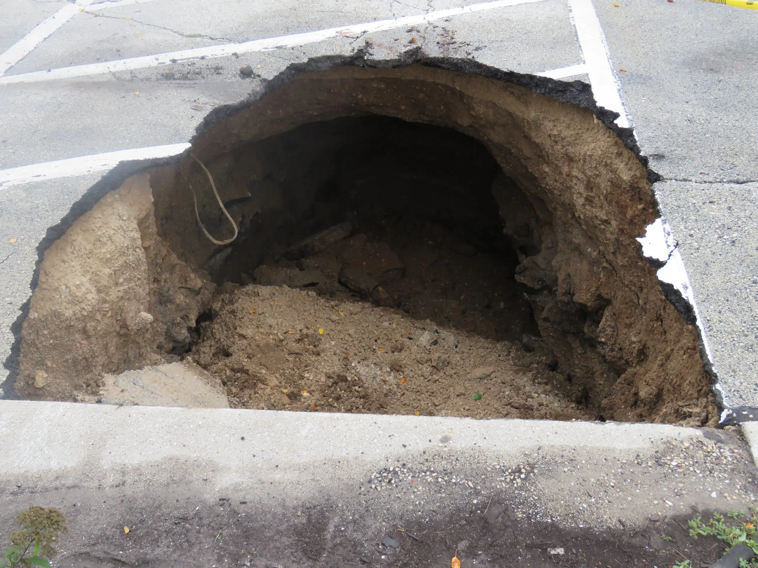 Parking Lot Will Close Next Week To Repair Collapsed Storm Sewer Pipe