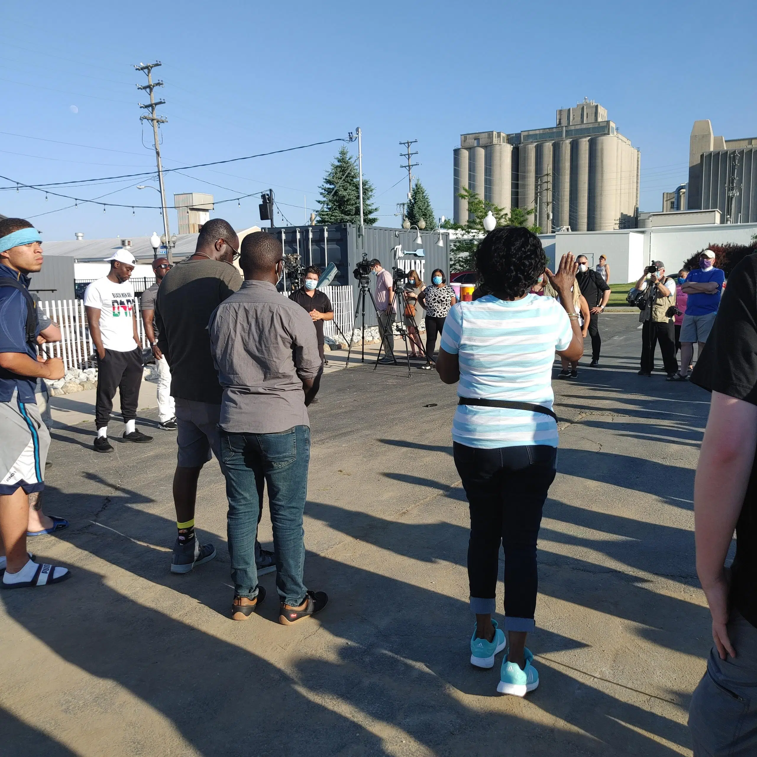 Protesters Gather at The Wharf in Manitowoc, Hold Discussion with Businessman Pictured in Racially Insensitive Photo