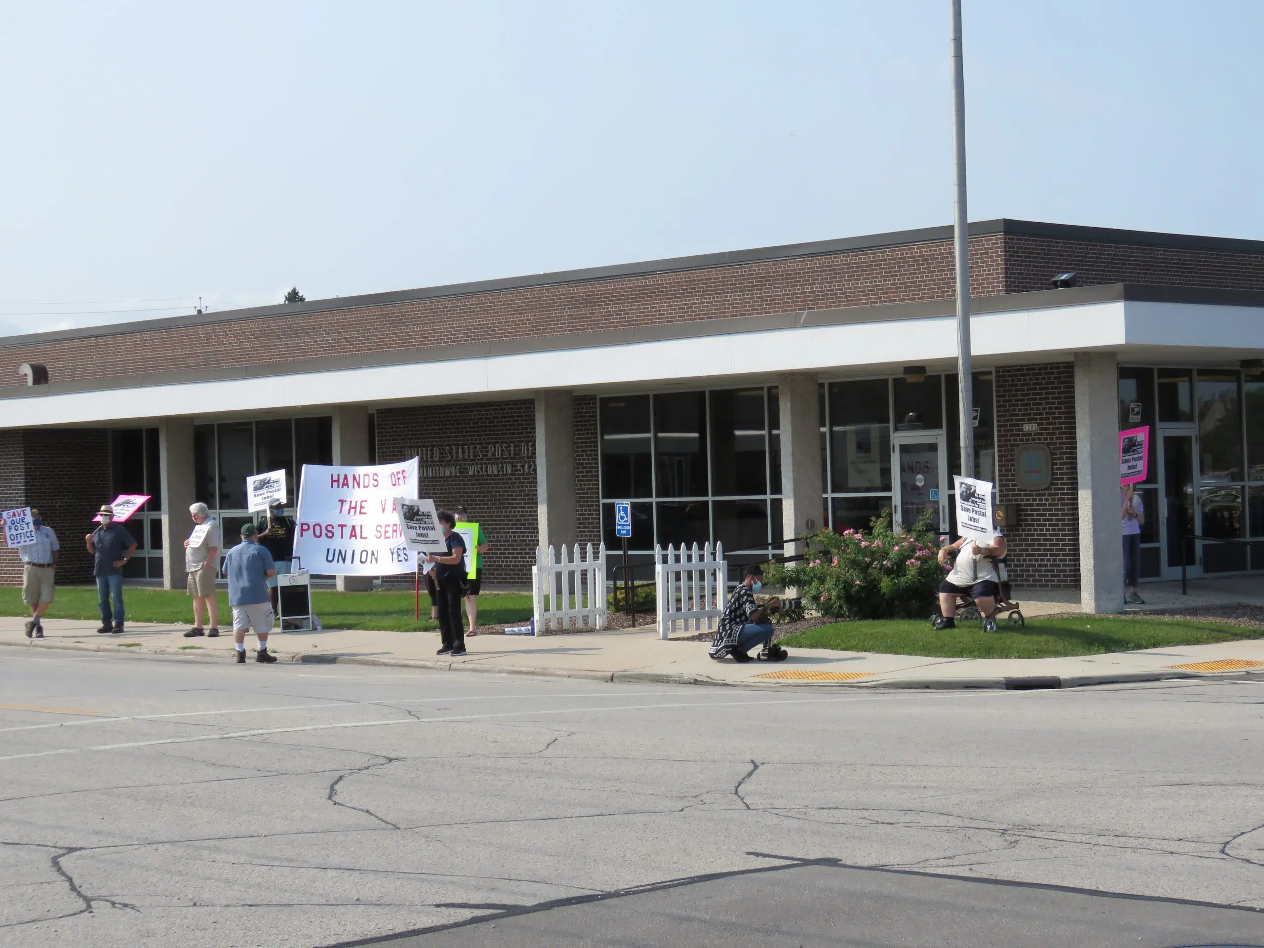 Area Organization Holds Rally Outside Manitowoc Post Office in Support of Workers