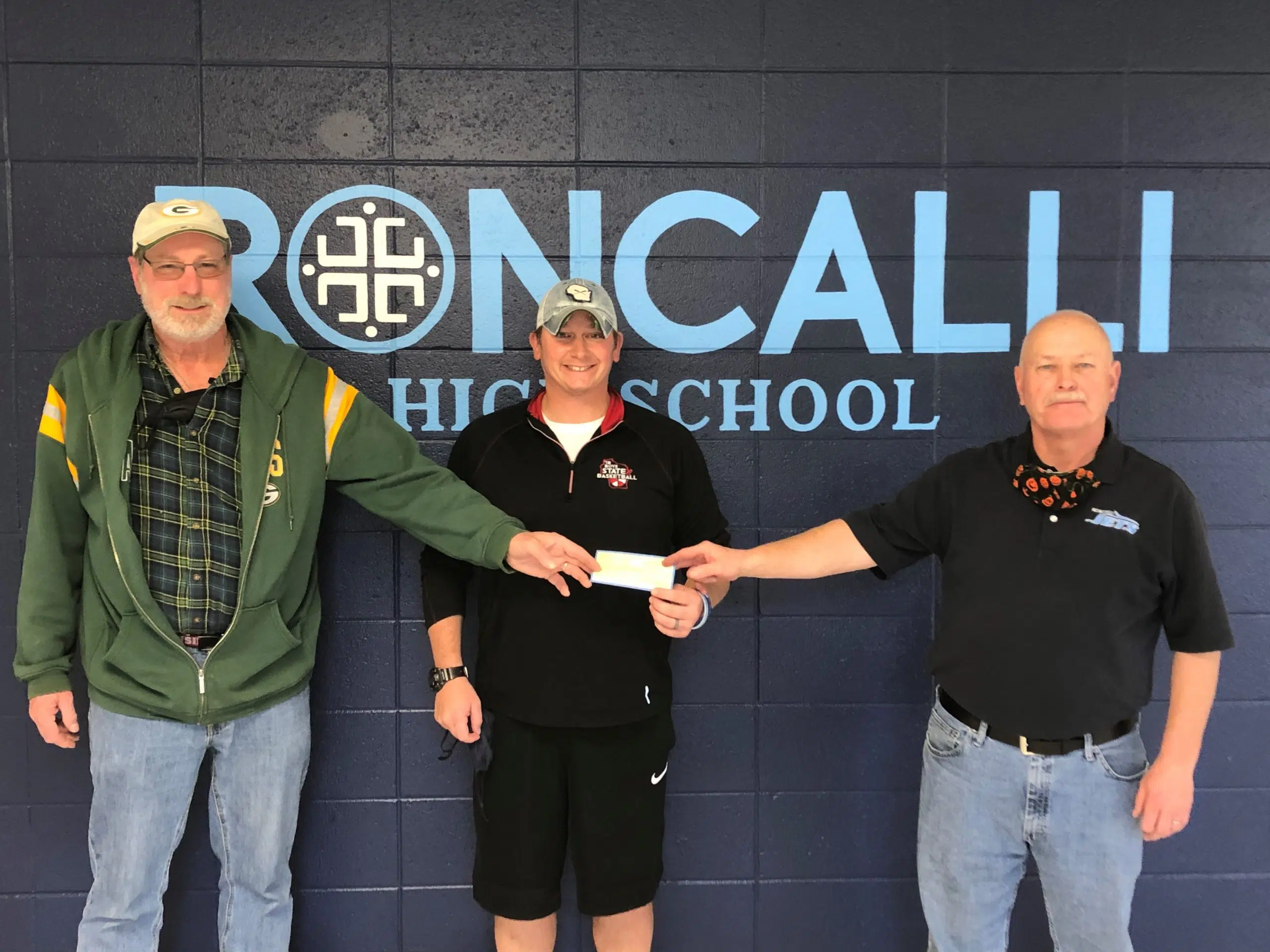 Volleyball Tournament Proceeds Donated to Roncalli Catholic Schools