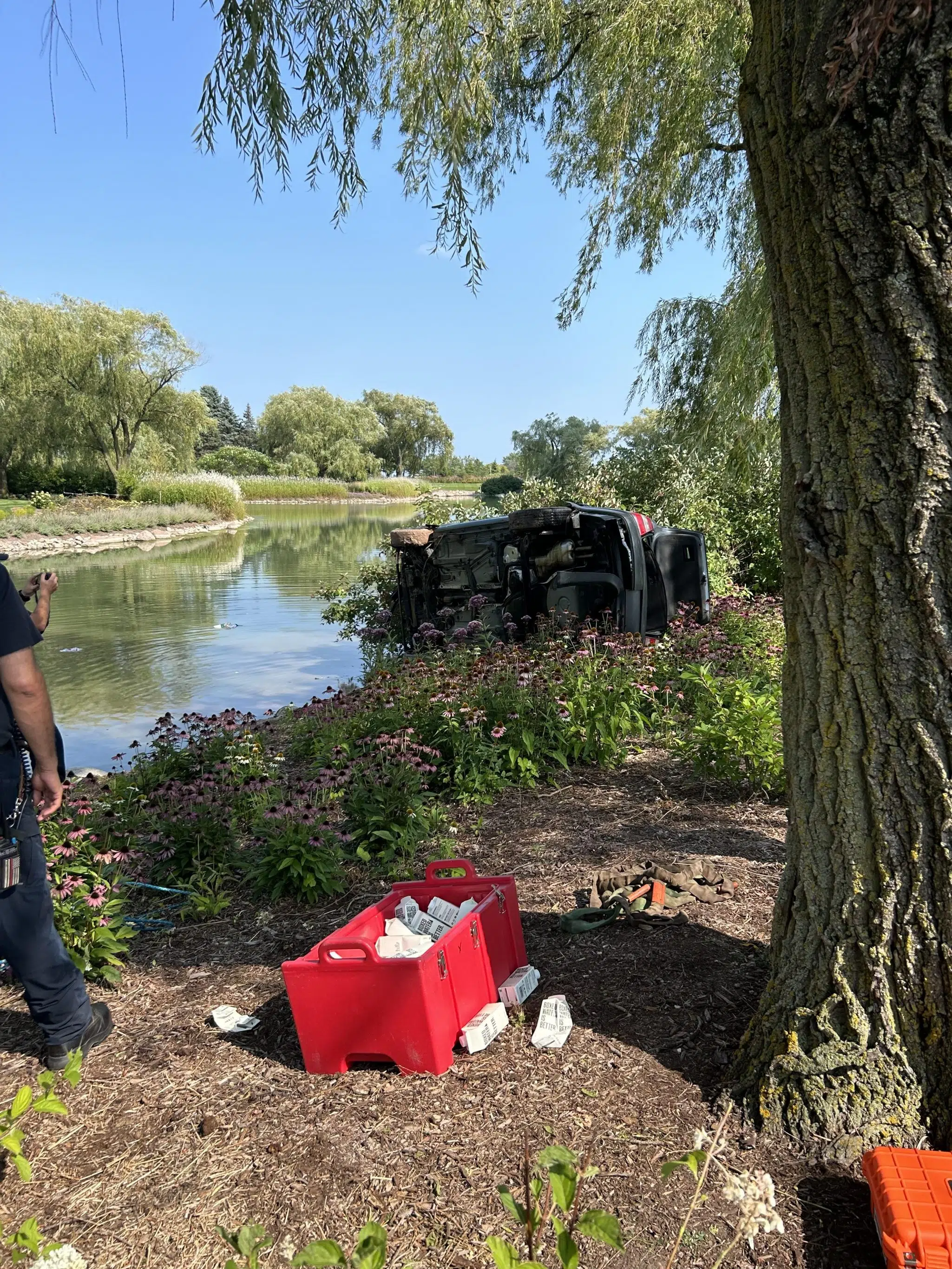 Vehicle Crashes into Retention Pond at Acuity Insurance