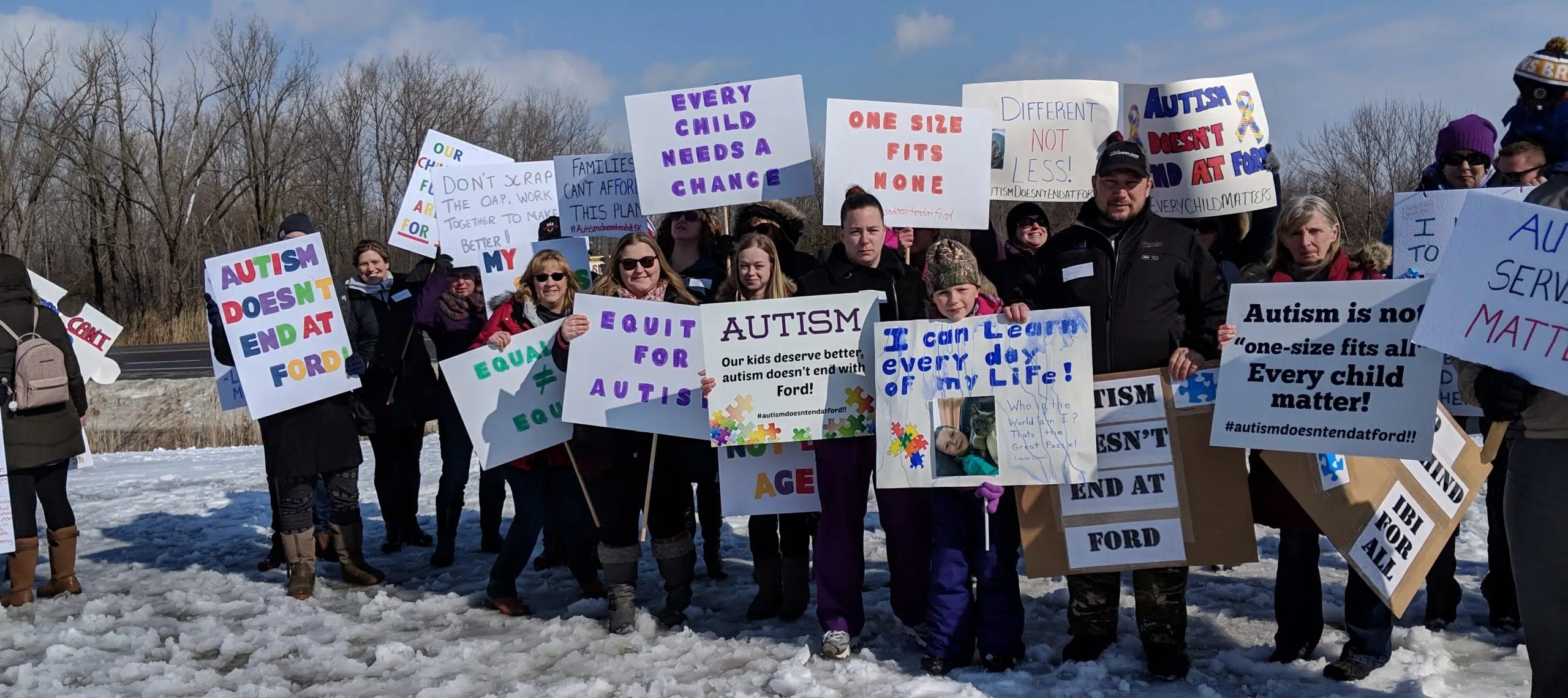 Parents and supporters rally against autism funding changes