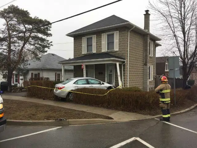 Car slams into house