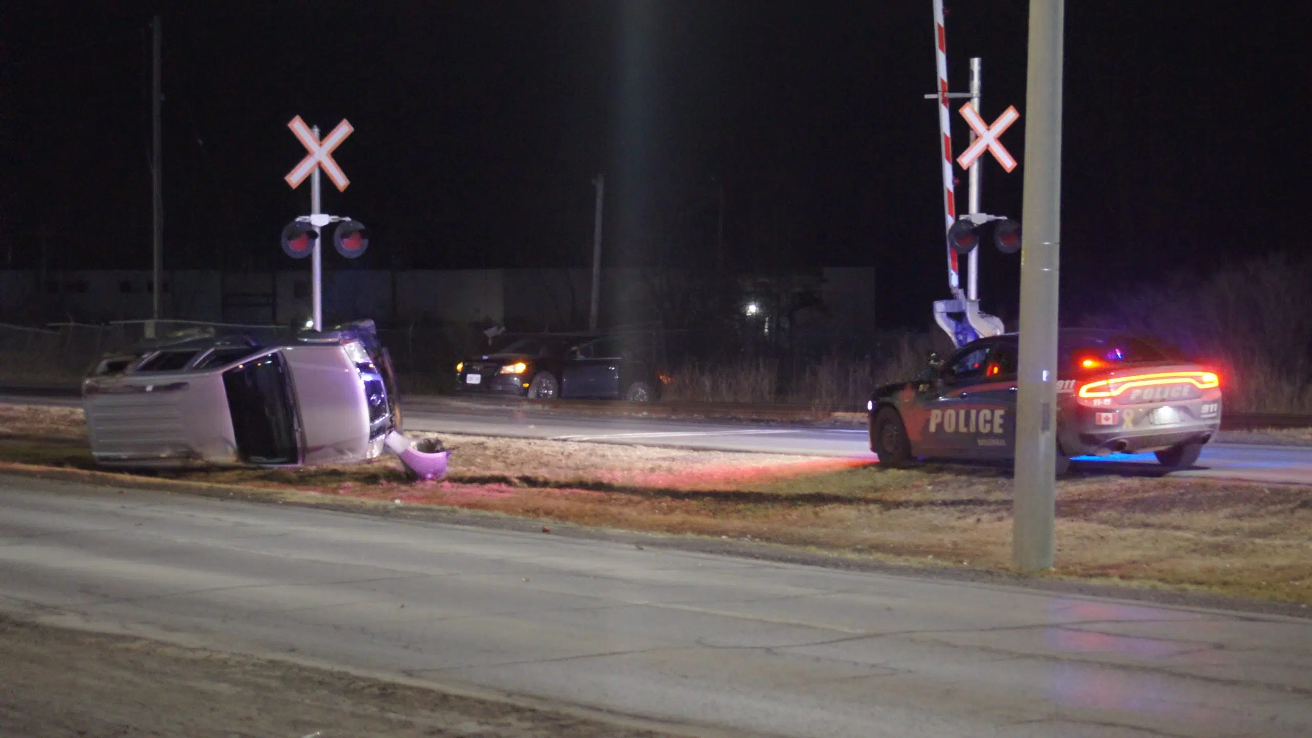 Car flips near CP tracks Belleville