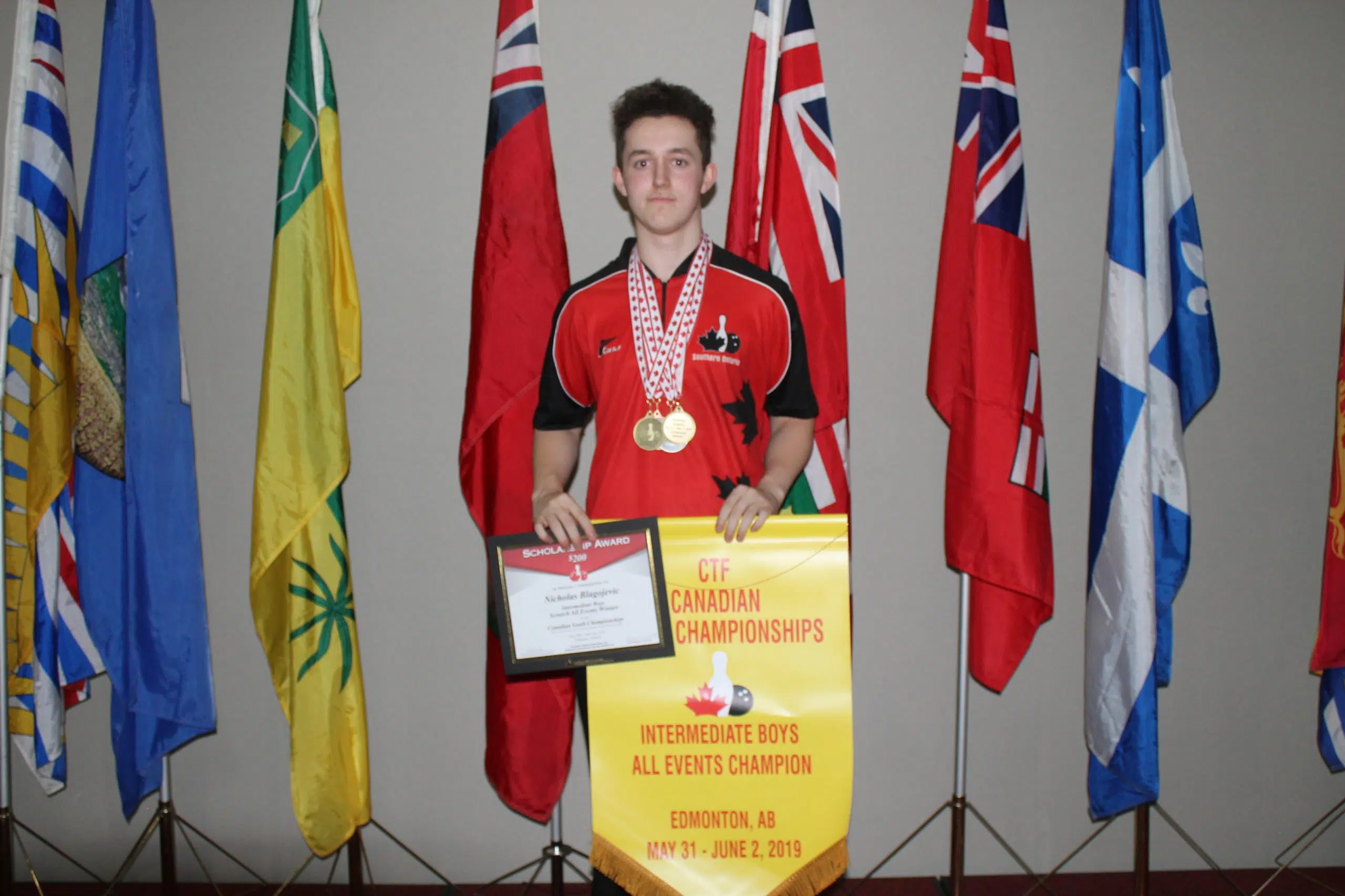 4 medals for Nicholas 