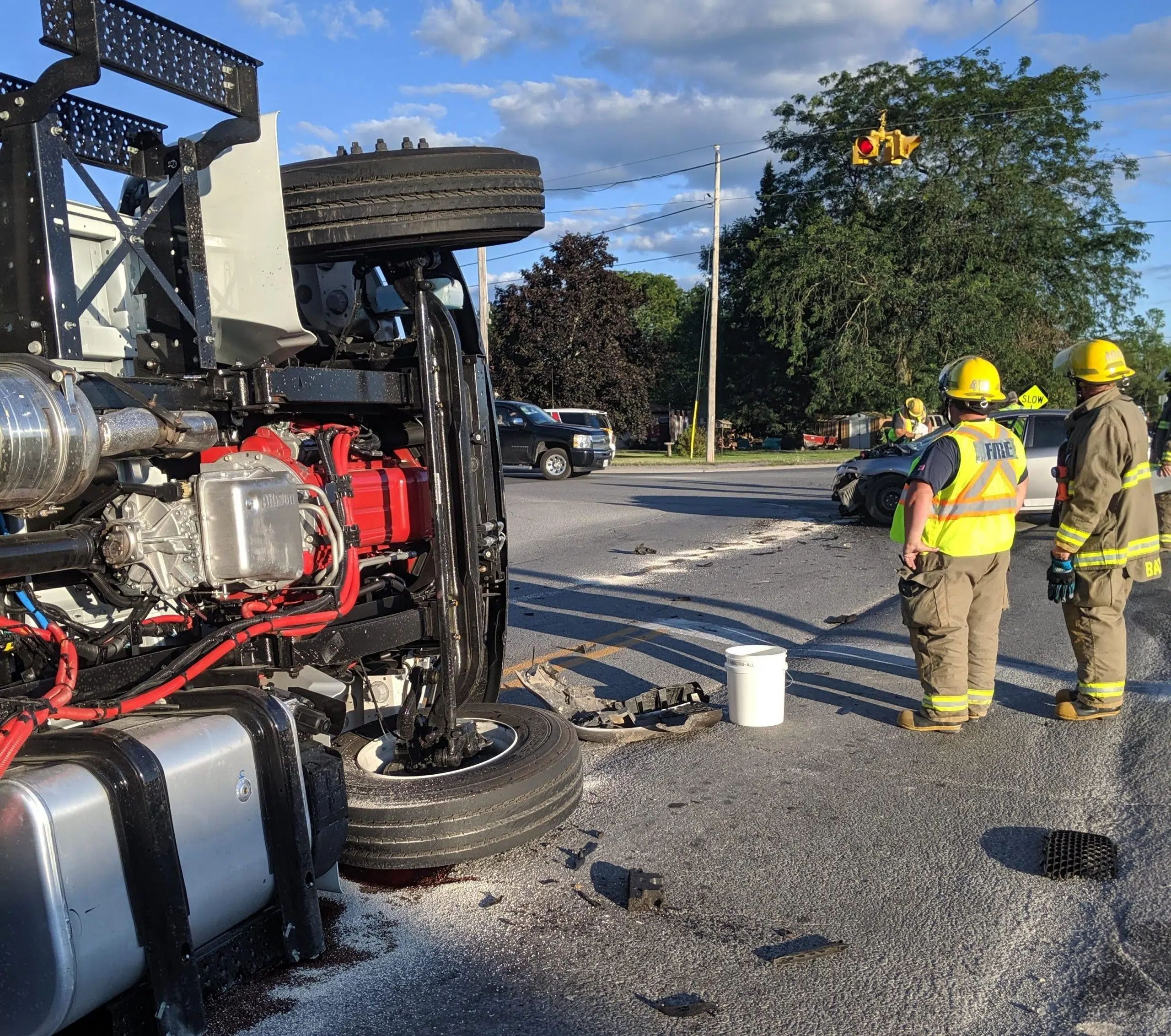 Truck flips in QW