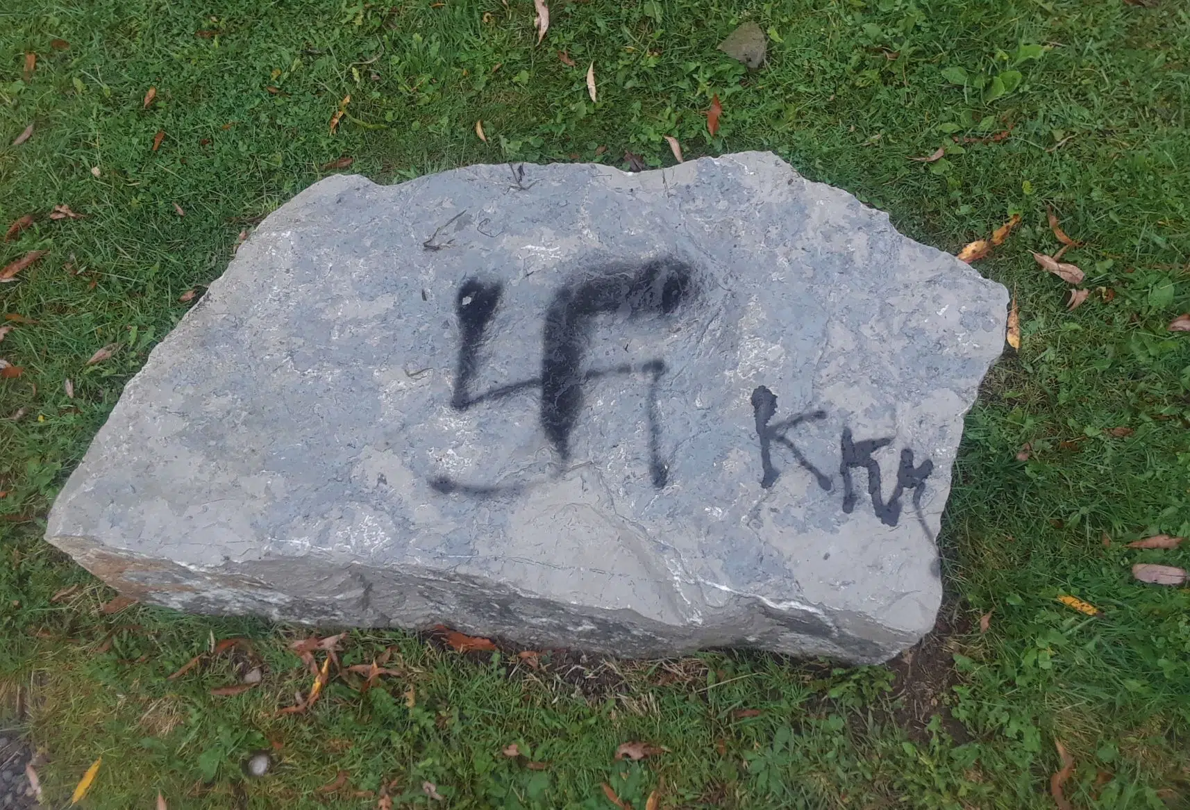 PHOTOS: KKK sprayed on rock in Harwood