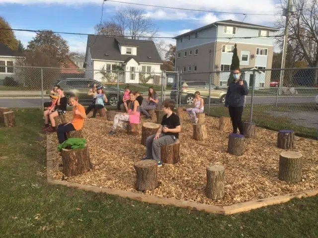 Students work to build own outdoor classroom