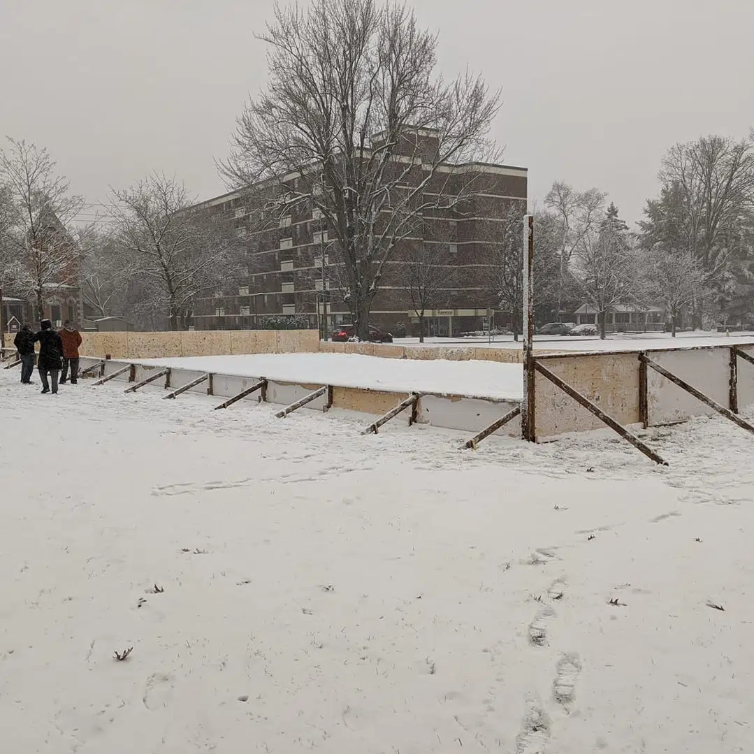 East Hill group building community ice rink in Belleville