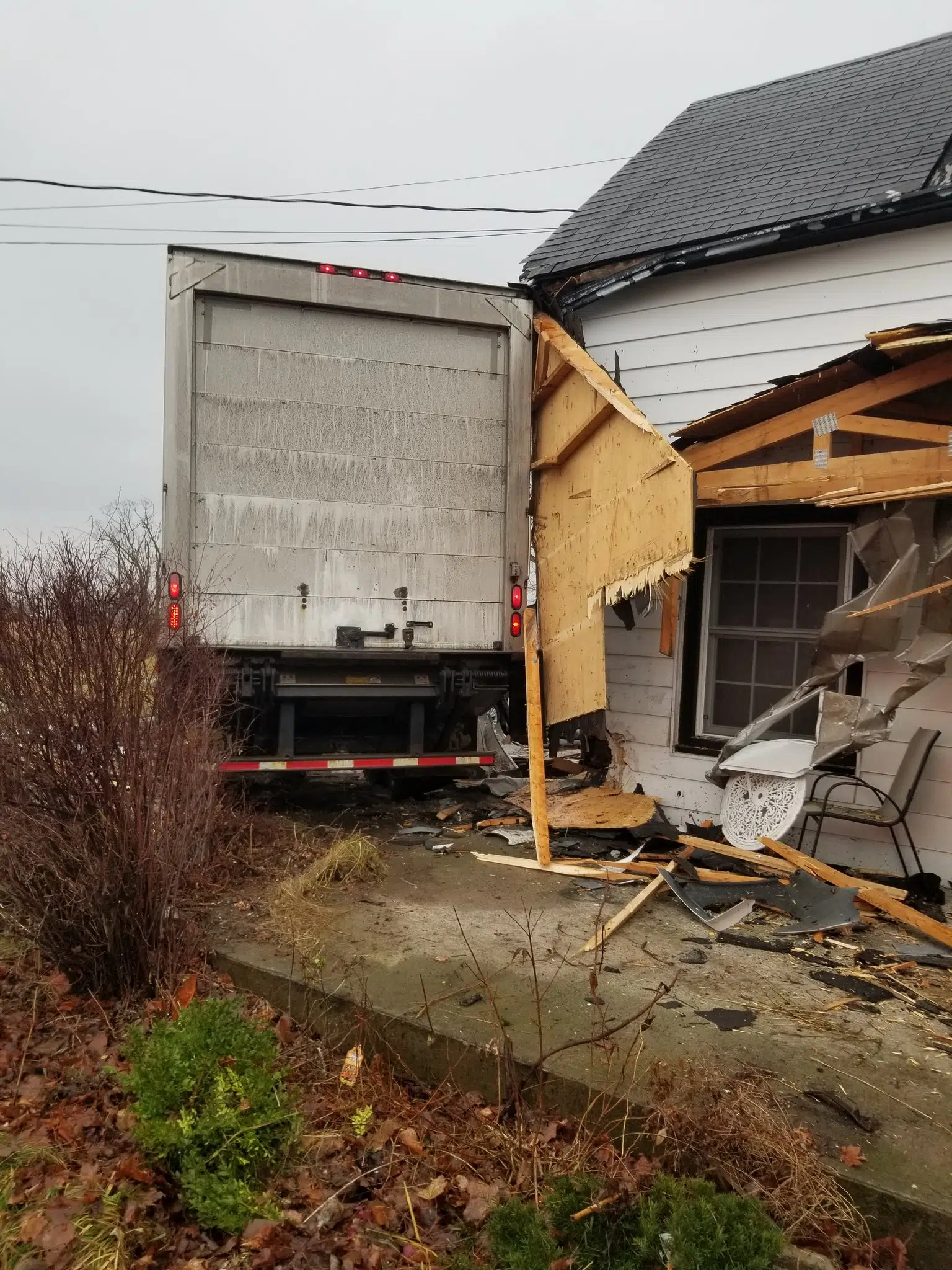 Driver dies after careening into house