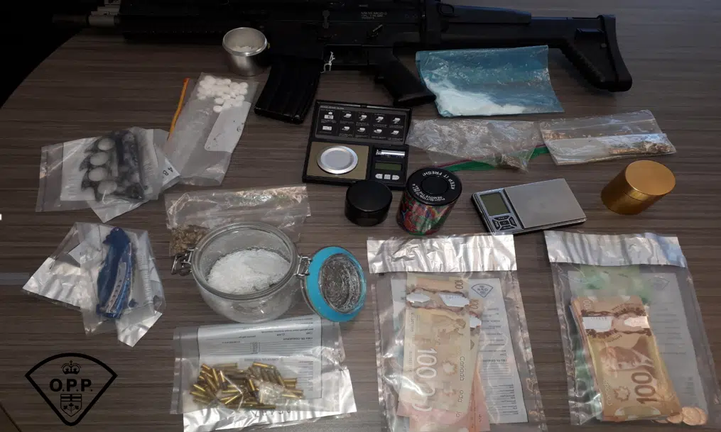 Three people facing charges after Faraday Township search warrant yields drugs, weapons