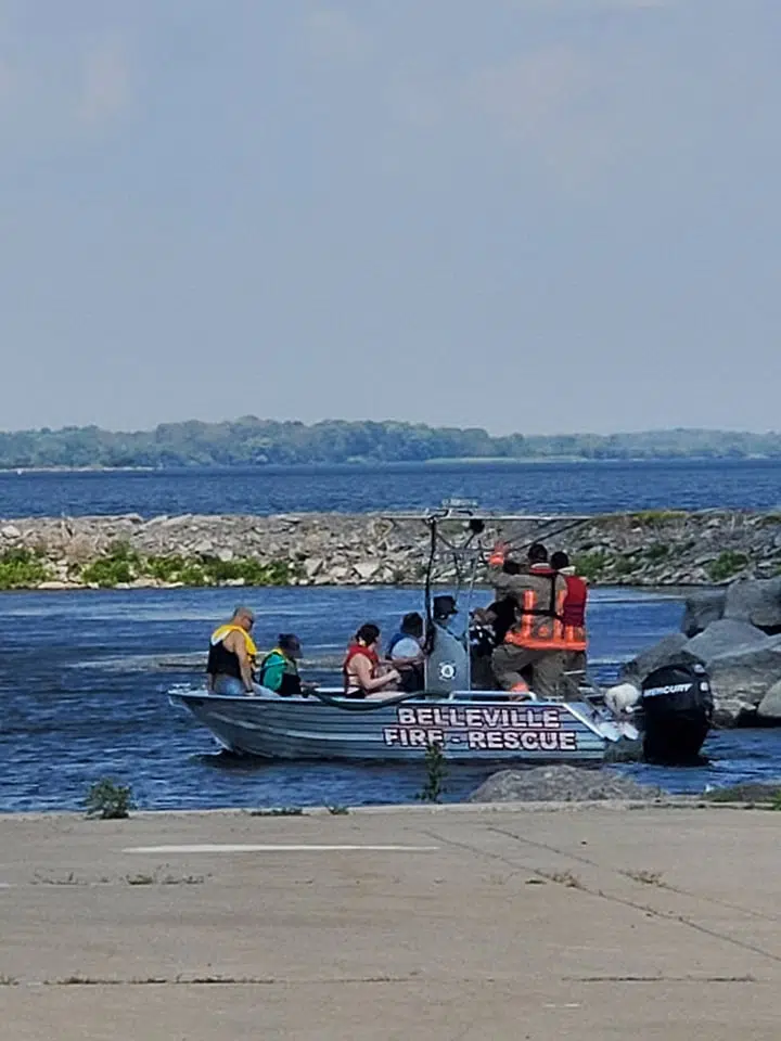 Fire fighters rescue five people from smoking boat off Meyers Pier