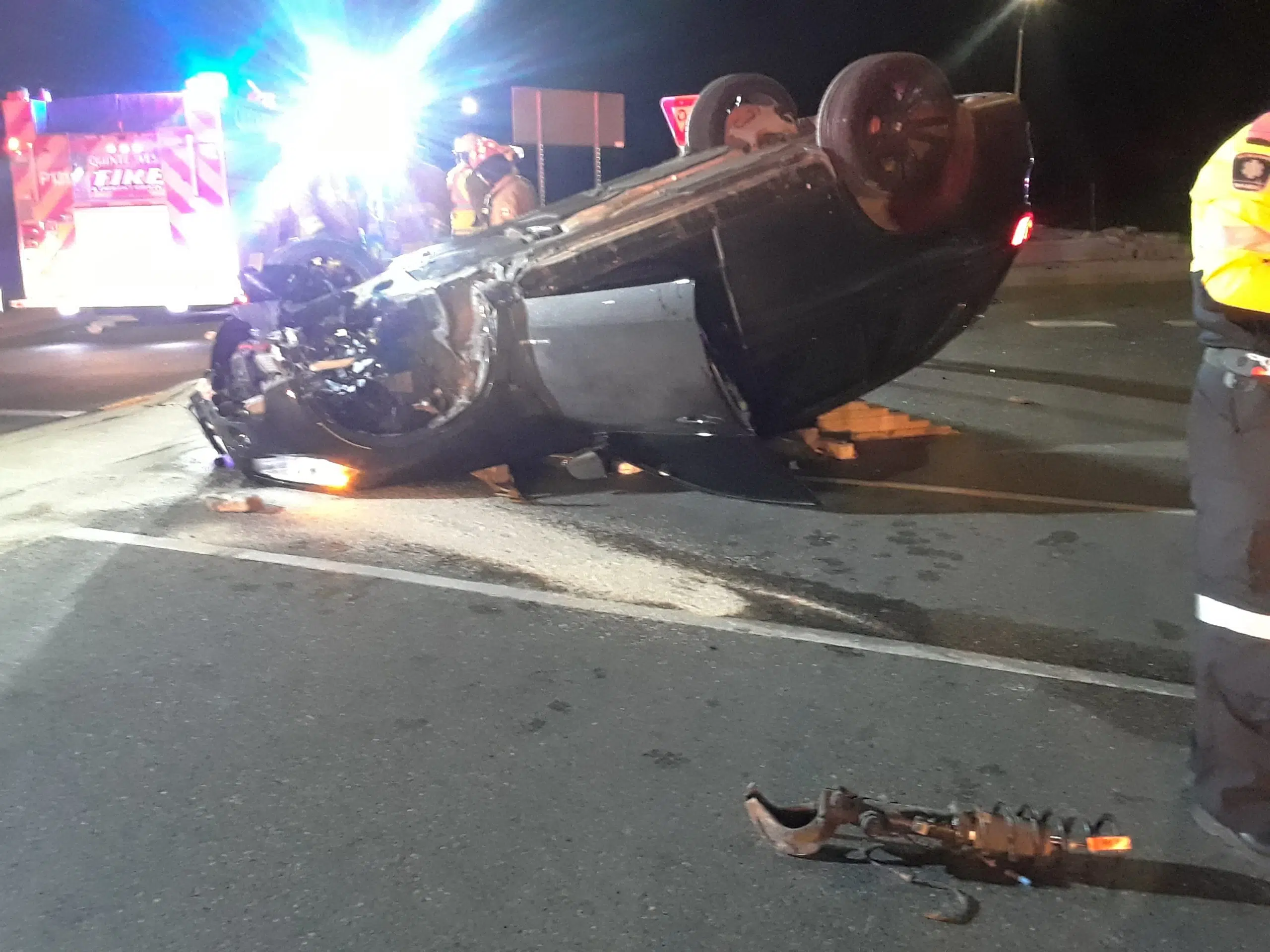 Vehicle rolls onto roof at roundabout