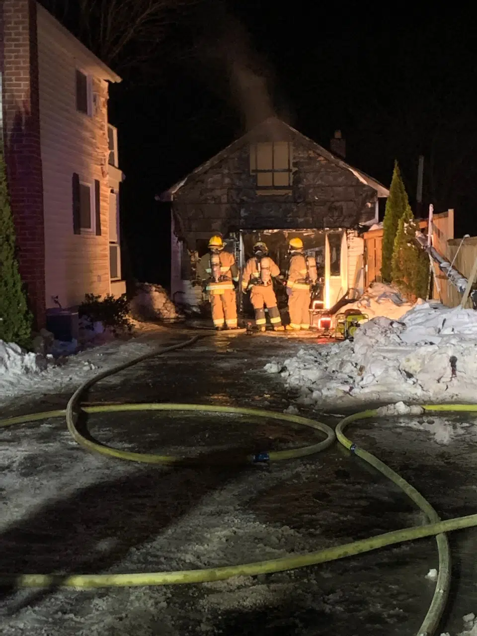 Garage burns down but home saved