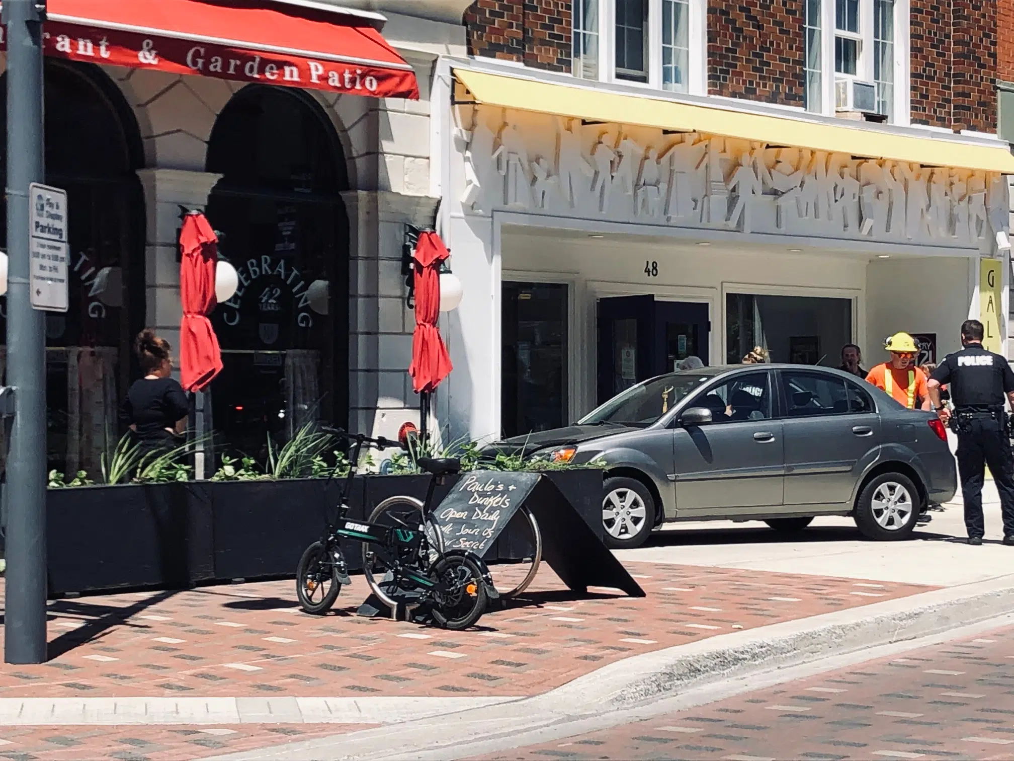 Car veers onto sidewalk in Belleville's Downtown District