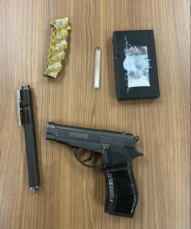 Imitation firearm and drugs seized in traffic stop