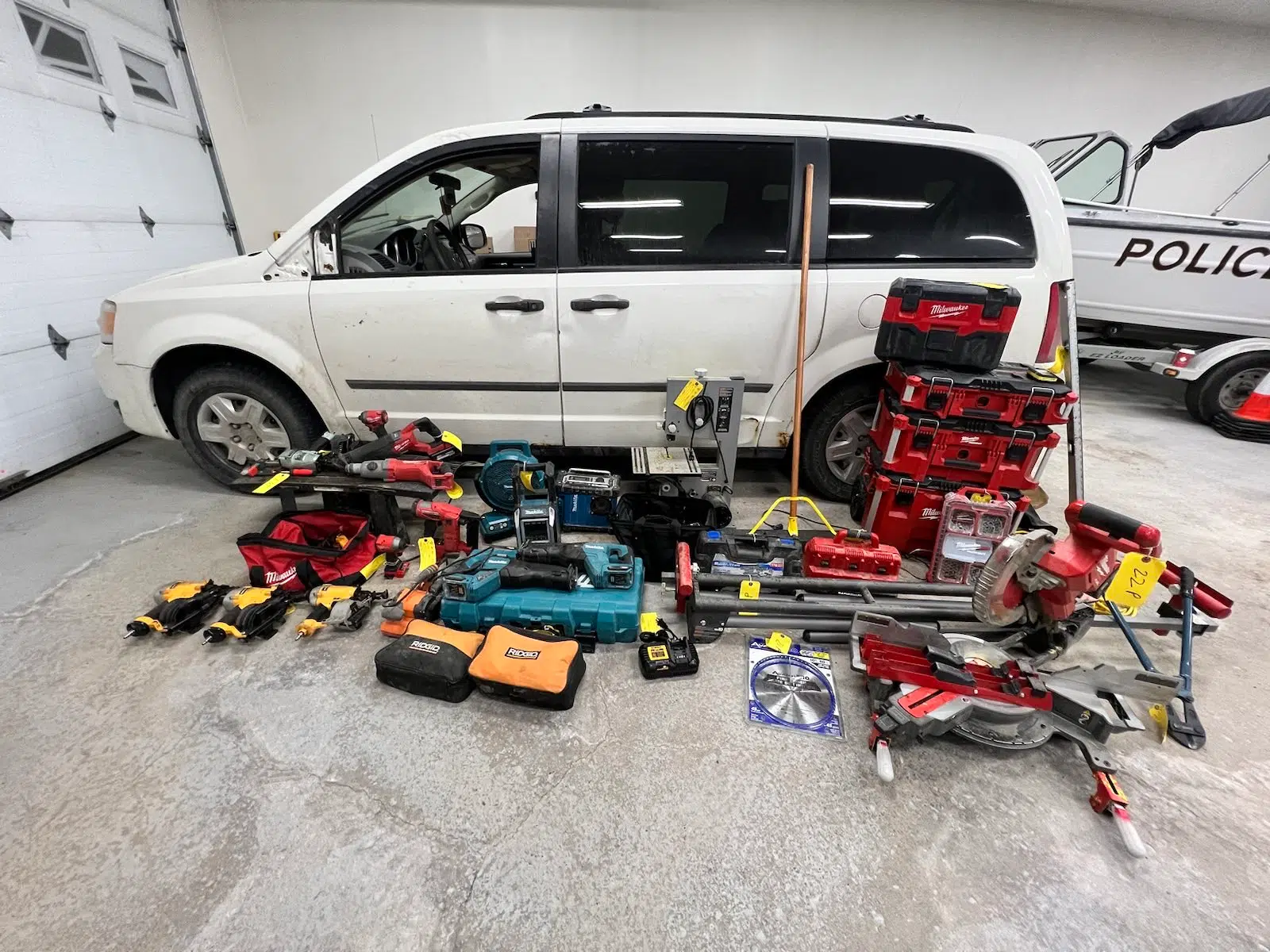 Three people charged after stolen tools recovered