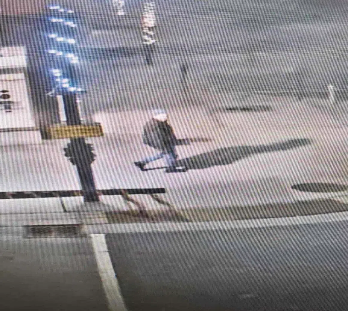 Police seeking person of interest in connection with downtown dumpster fire