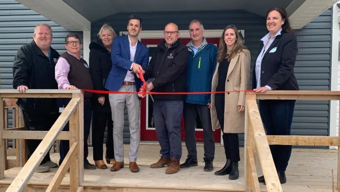 Ribbon cutting for transitional housing facility in PEC