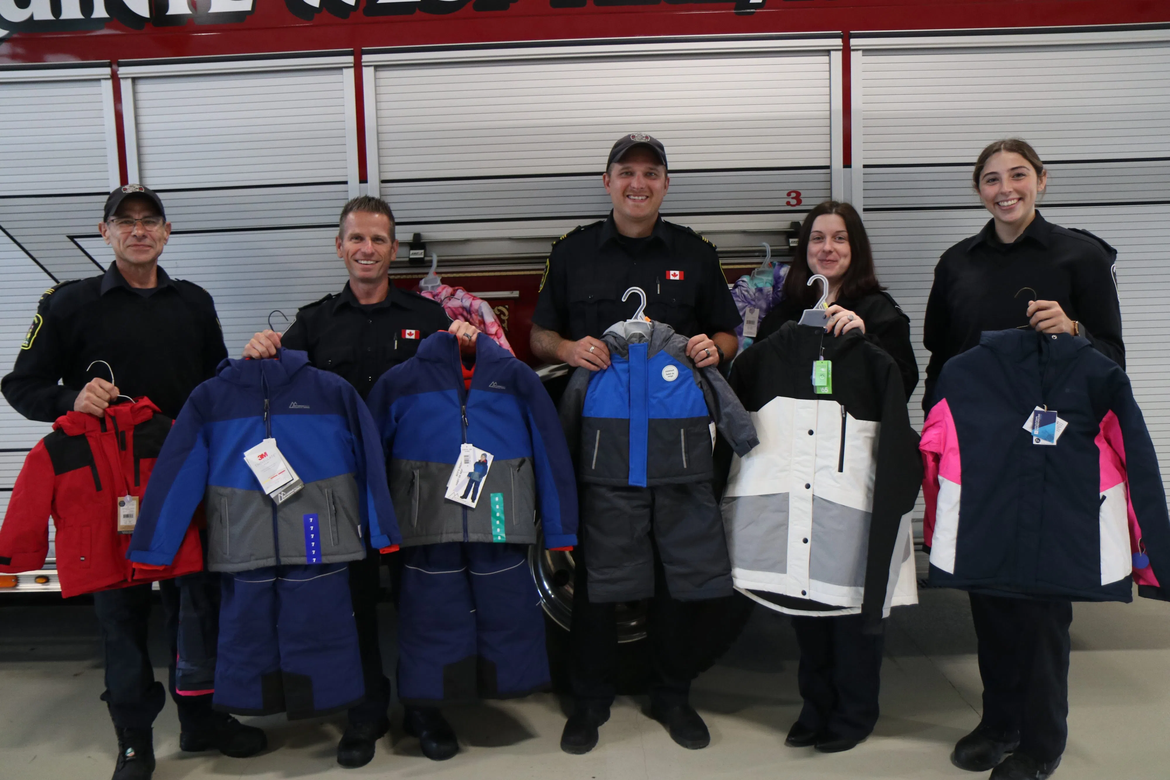 Quinte West firefighters collecting children's winter clothing