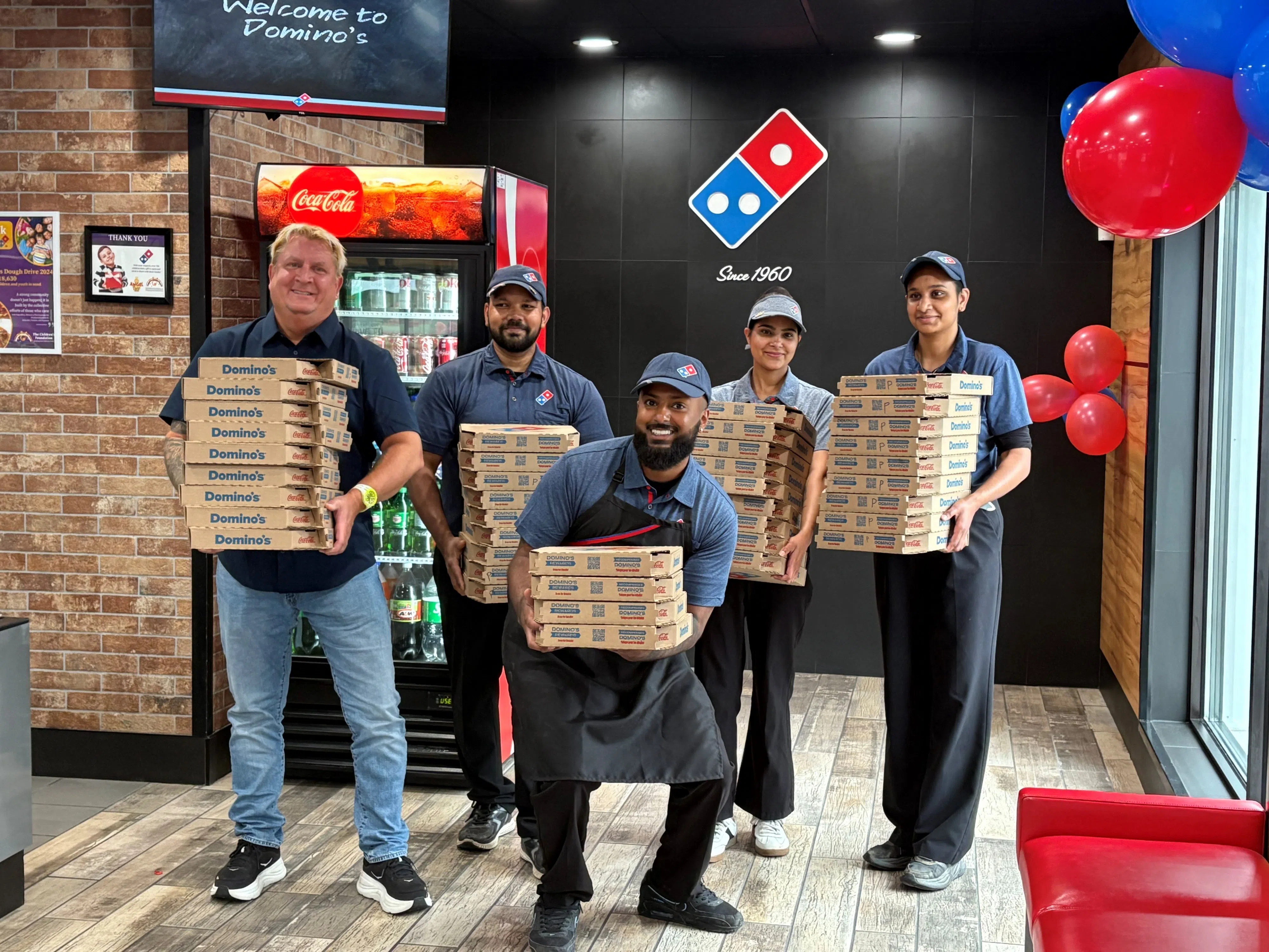 Domino's raises dough for Children's Foundation