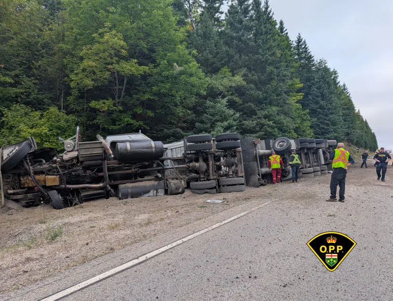 Tractor-trailer rollover on highway 62