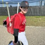 Evan James with his baseball gear