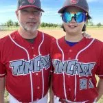 Evan and his dad with the tincaps