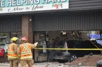 Vehicle Drives Through Front of Angus Business