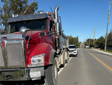 Barrie Police charge dump truck driver after power lines were struck